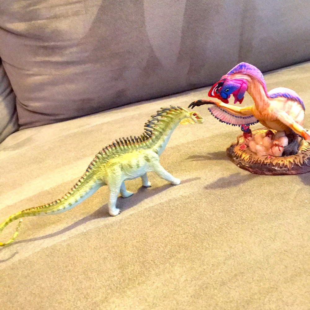 Oviraptor on nest and Amargasaurus